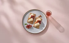 Snack platter with roasted grapes, brie, and crackers