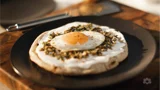 Fried Egg on Pita Bread with Green Olive Paste and Cream Cheese Spread