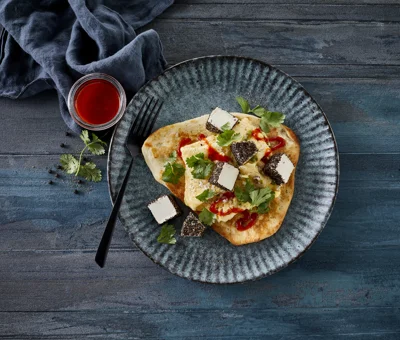 NAAN TOAST WITH SCRAMBLED EGGS & PEPPER CREAM CHEESE