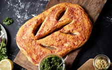 Fougasse with Matured Cheddar, tomatoes and curly kale pesto