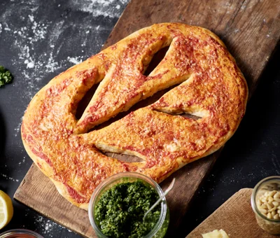 Fougasse with Matured Cheddar, tomatoes and curly kale pesto