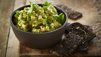 Avocado mousse with rye bread chips