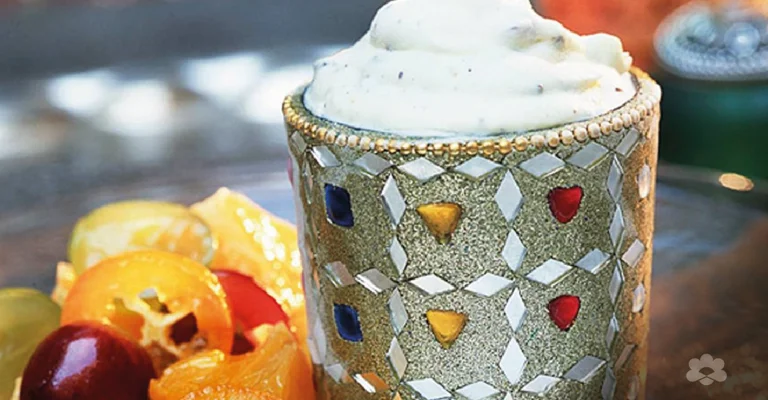 Yogurt ice cream with cardamom and almonds