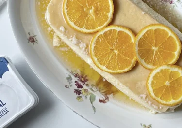 Flan de queso Arla Natural de untar, naranja y caramelo