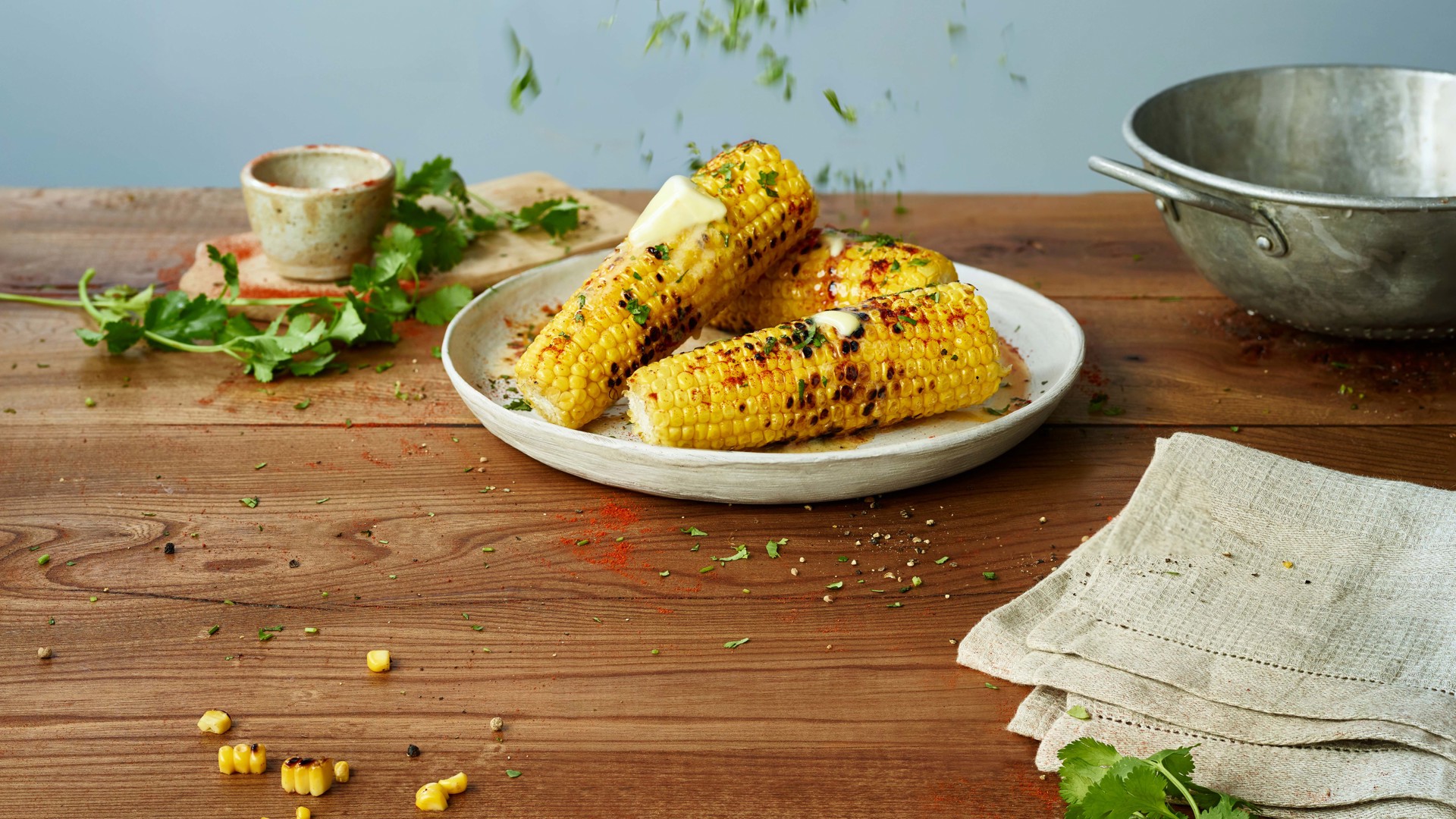 Griddled corn on the cob with paprika and coriander butter