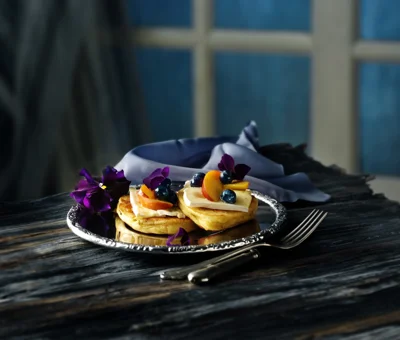 Thick pancakes with blueberry and cheese