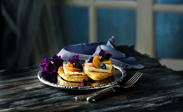 Thick pancakes with blueberry and cheese