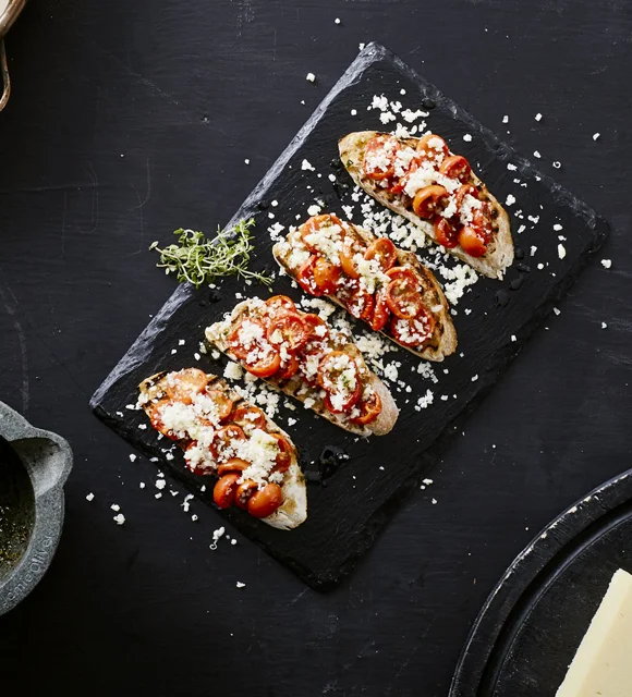 Bruschetta with semidried tomatoes &  grated Cheddar