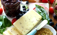 Simple cheese board with double berry chia seed jam