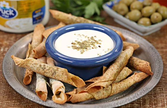 Mini zaatar bites with cheddar cream cheese dip
