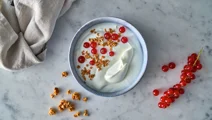 Homemade granola and red berries topping for Skyr
