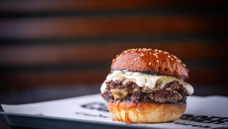 Triple cheese truffle burger with onion jam