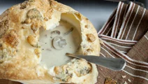 Mushroom soup with puff pastry lid