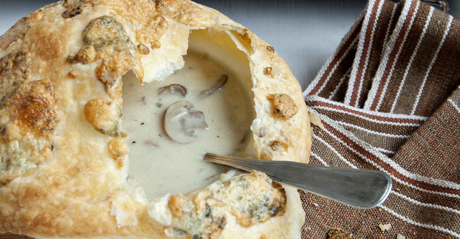 Mushroom soup with puff pastry lid