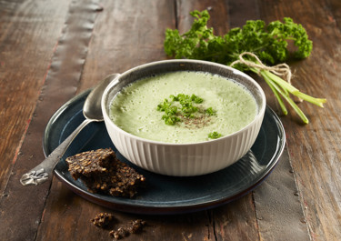 Parsley soup with rye bread croutons