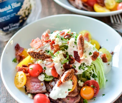 Classic wedge salad with warm honey fig Blue Cheese