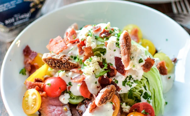 Classic wedge salad with warm honey fig Blue Cheese