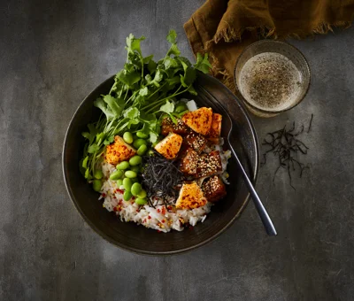 Rice bowl with salmon, coconut, and Castello® Chili & Ginger cream cheese