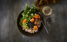Rice bowl with salmon, coconut, and Castello® Chili & Ginger cream cheese