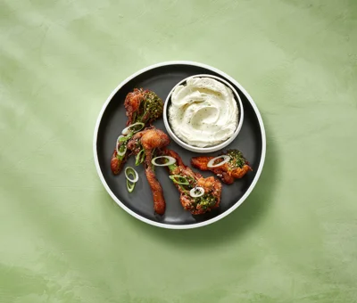 Fried broccoli with Castello® garlic whipped cream cheese