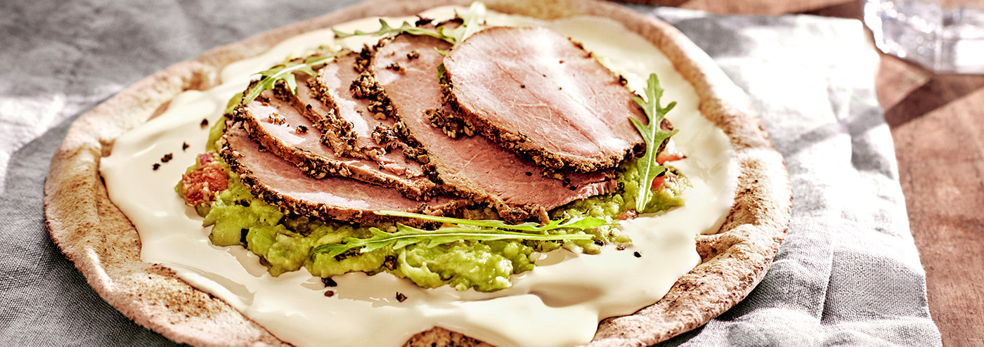 Arabic bread with cheese, guacamole, roast beef or pastrami and rocket salad
