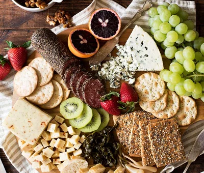 Cheese board with maple candied walnuts