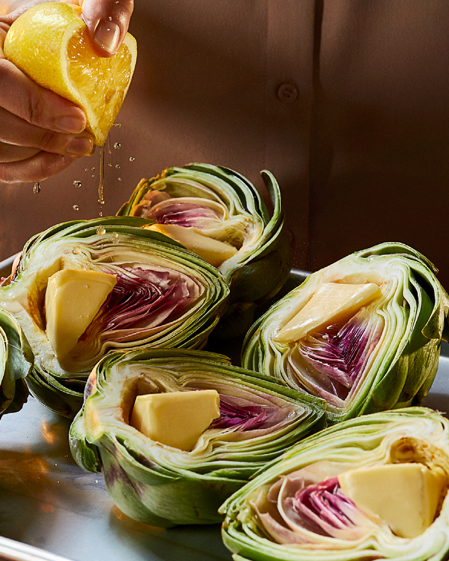 Carciofi interi con burro al limone