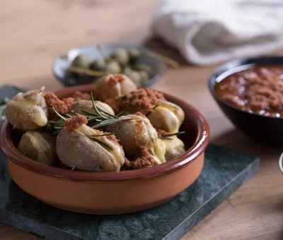 Hasselback potatoes with Mature Cheddar and salsa