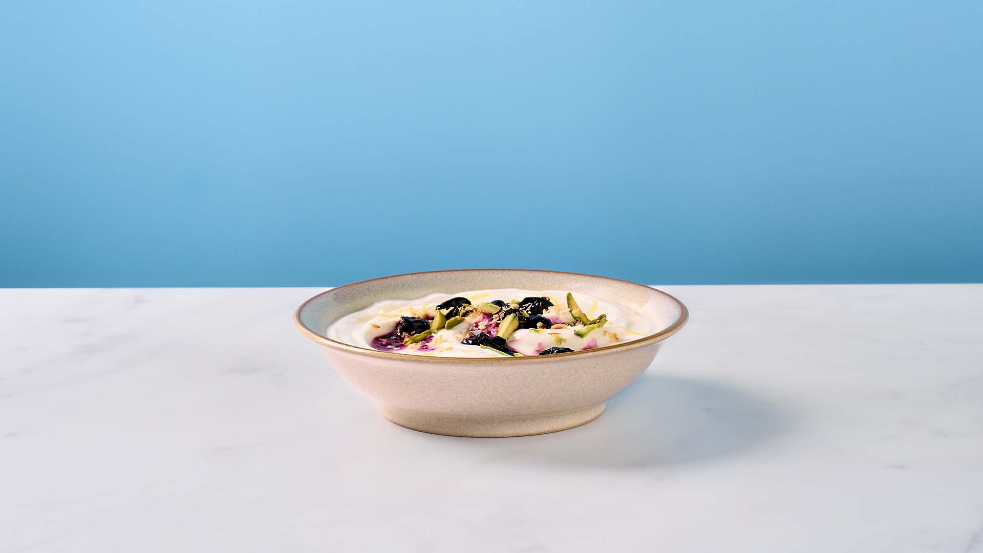 Lactose free blueberry & pistachio yogurt bowl