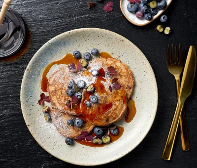 American pancakes with chocolate and blueberries