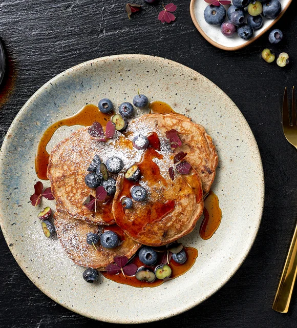 American pancakes with chocolate and blueberries