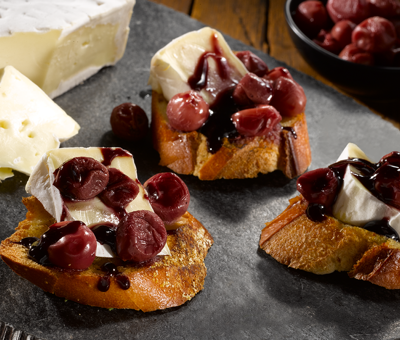 Castello Extra Creamy Brie with poached grapes