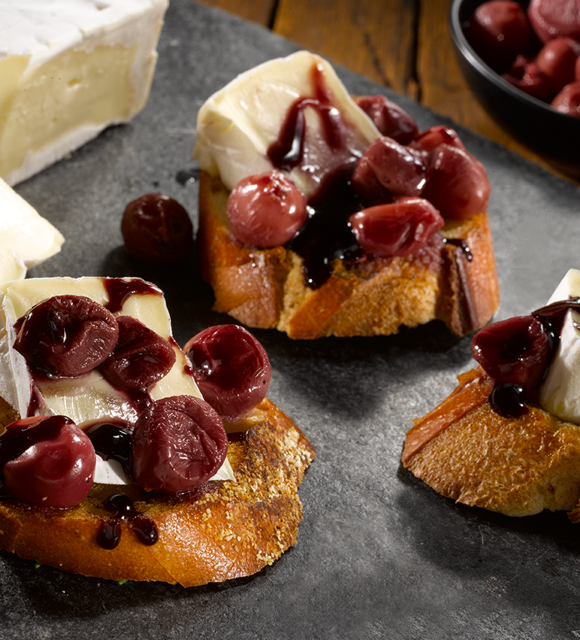 Castello Extra Creamy Brie with poached grapes