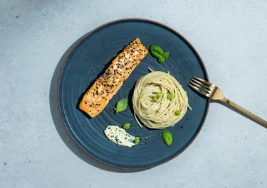 Lactose-free cream cheese pesto pasta with salmon