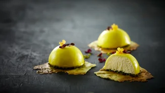 Lemon mousse with glaze and pistachio tuile