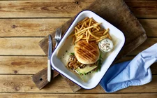 Mature Cheddar steak burger with caramelised onions and portobello mushrooms
