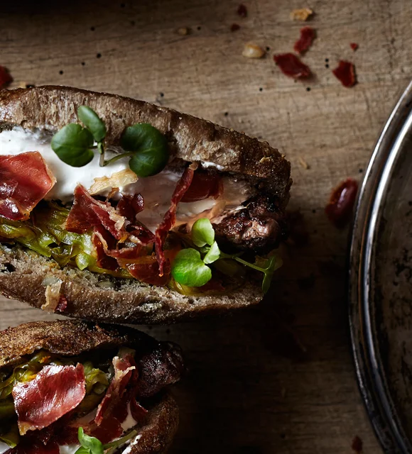 Steak hot dog with Castello Danish Blue and horseradish dressing