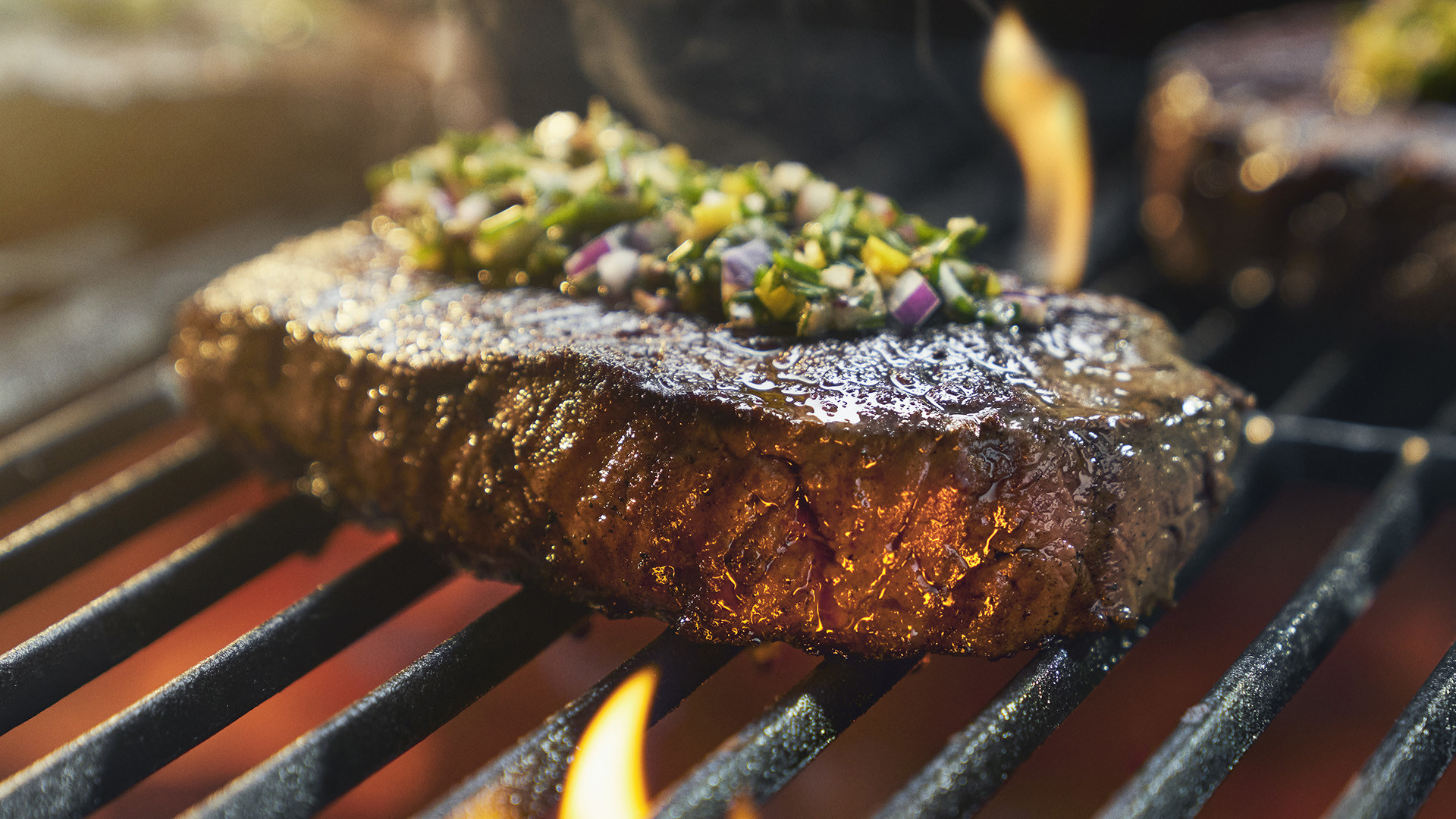 Steak with buttery herb sauce