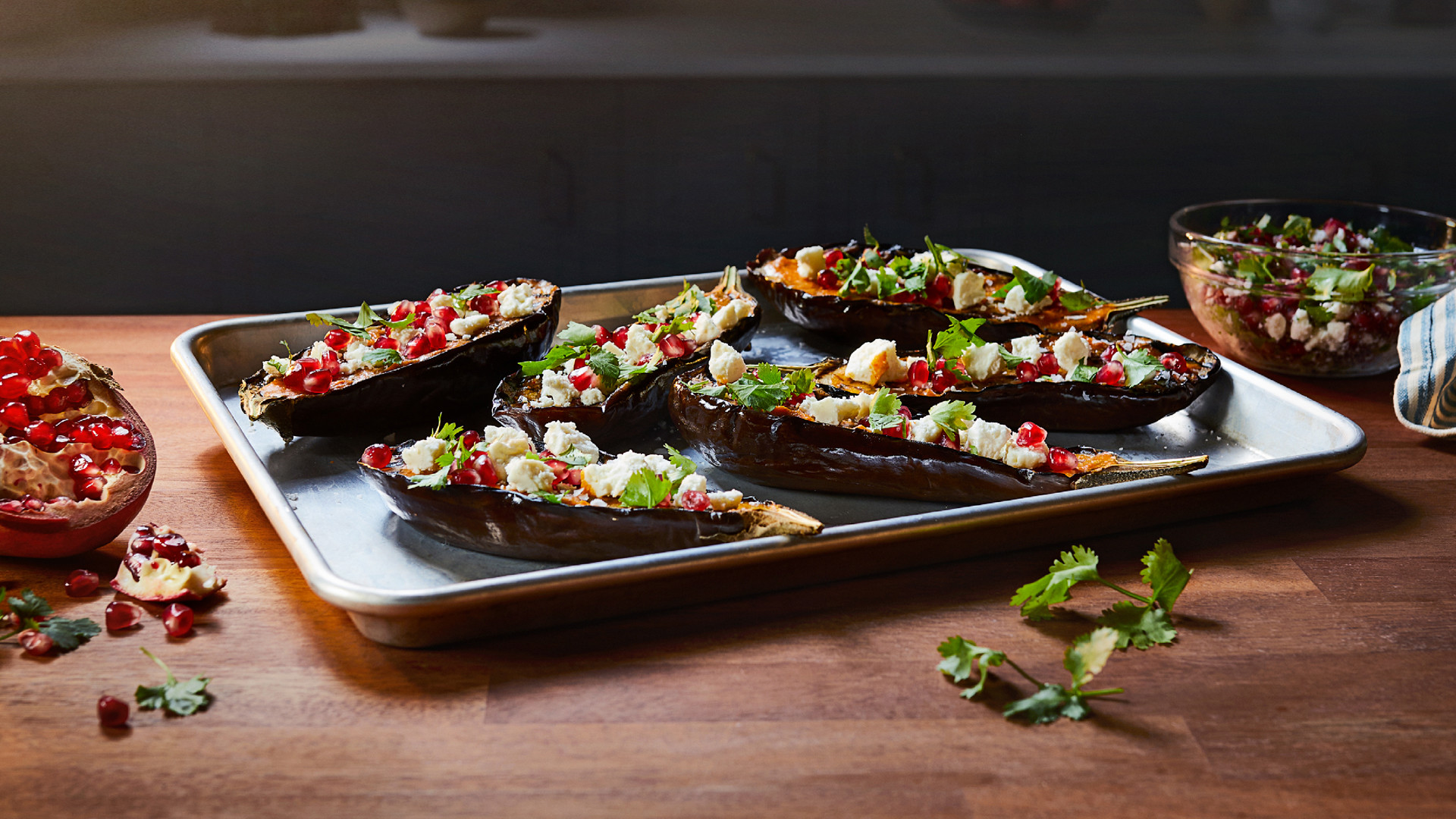 Baked aubergines with feta and pomegranate