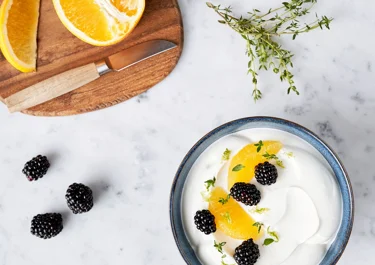 Skyr bowl with blackberry, citrus and thyme