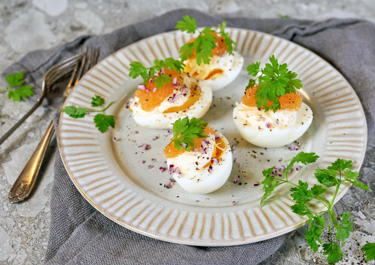 Ägghalvor med romröra