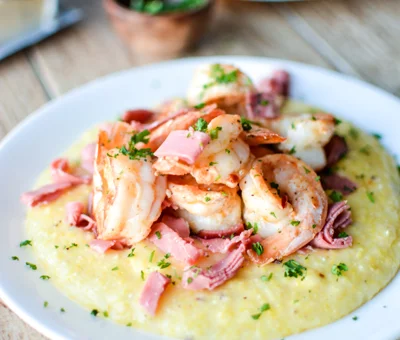 Caraway Havarti grits with shrimp and corned beef