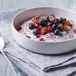 Skyr bowl with ginger, dried figs, and fresh berries