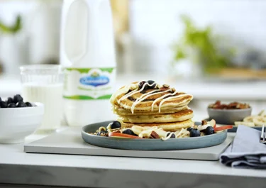 Cinnamon swirl pancakes with cream cheese drizzle