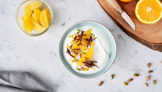 Skyr bowl with orange, chocolate, and pistachio