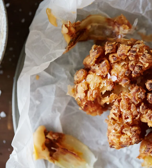 Blooming onion with chipotle cheese dip