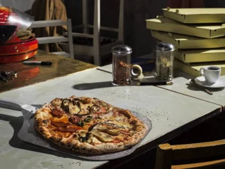 Pizza quatre saisons traditionnelle