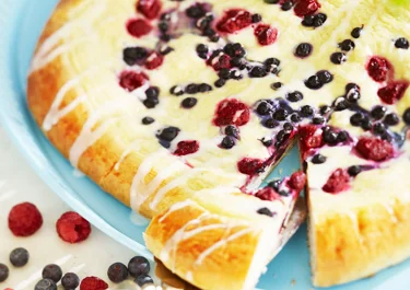 Stor solbulle med blåbär och hallon