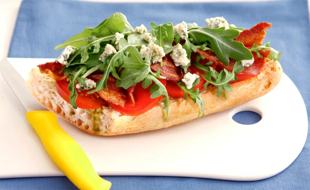 BLT salad on toasted baguette with blue cheese