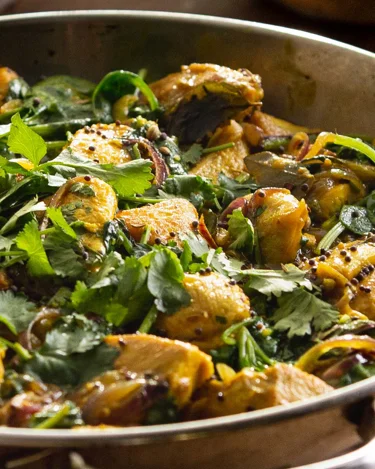 Kοτόπουλο με κάρυ και φακές